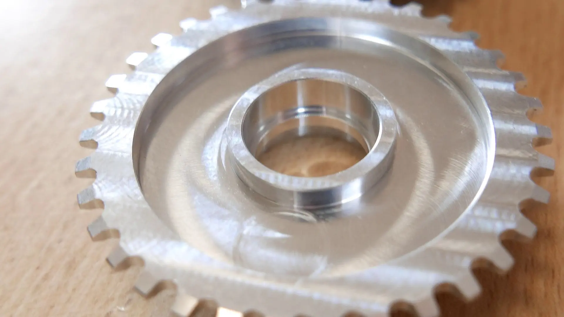 Closeup of the KoumKoum wheel sprocket, machined from aluminium
